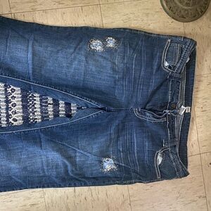 Women's Blue Distressed Jeans H2j I measured I’m assuming it’s a 20 the tag was